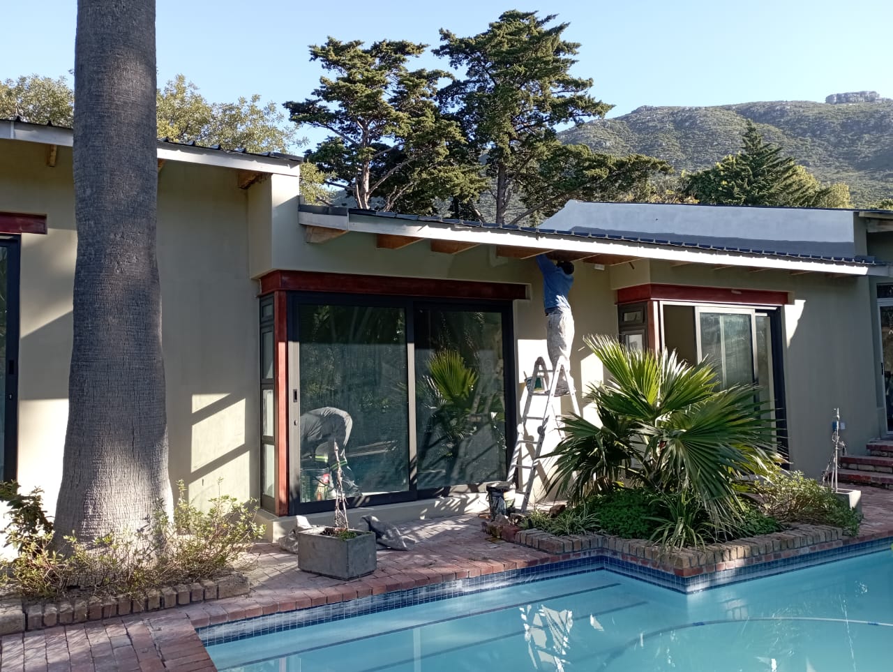 Poolside exterior painting